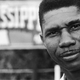 Medgar Evers, NAACP’s first field secretary for the state of Mississippi stands nearby a sign of the state Mississippi in this 1958 file photo.
